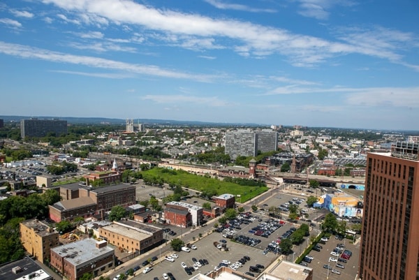 Essex County New Jersey skyline with commercial buildings, transportation hub, residential neighborhoods, and urban development near Newark NJ